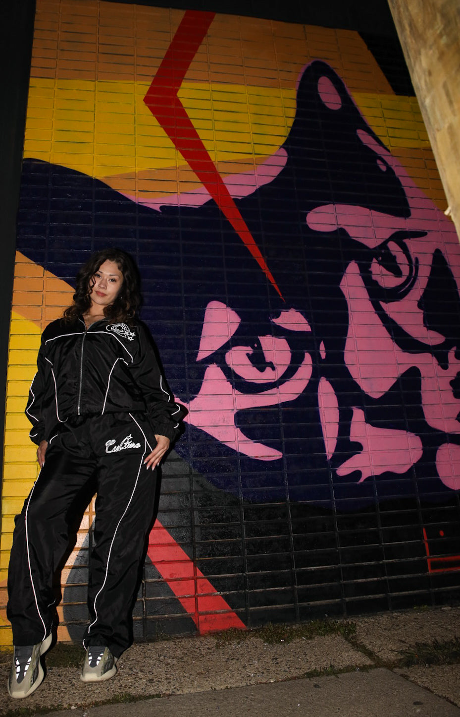 “After dark” reflective track pants